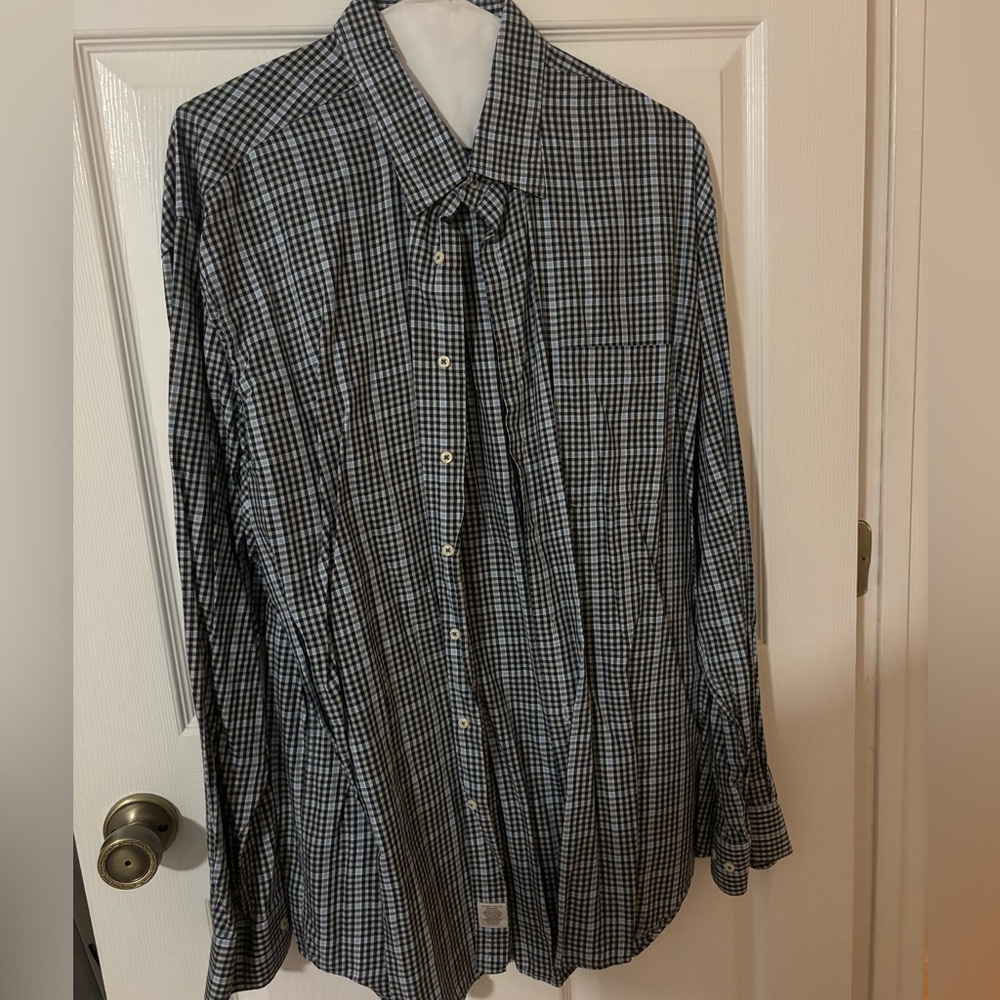 Blue, black, and white long sleeve button up shirt. Great condition. No returns!
